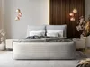 A modern bedroom with a large bed, bedside tables, and decorative lighting. Produktbild-Vorschau