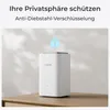 A white Reolink device with a lock icon above it, placed on a wooden surface against a wall. Produktbild-Vorschau