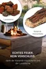 A fire pit with ceramic logs and lava stones, set in a living room environment. Produktbild-Vorschau