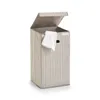 A laundry basket with a lid open, showing a white towel inside. Anteprima dell’immagine prodotto