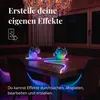A dining table with two potted plants illuminated by a colorful LED light strip. Produktbild-Vorschau