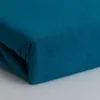 A close-up, folded view of a teal-colored fitted sheet. Produktbild-Vorschau