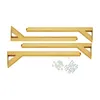 Four gold-colored Y-shaped table legs and hardware are laid out on a white background. Podgląd zdjęcia produktu