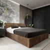 A modern bedroom with a large bed, wardrobe, and decorative elements. Podgląd zdjęcia produktu