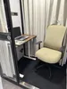 A small office pod with a desk, laptop, and chair. Produktbild-Vorschau