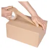 Hands taping a cardboard box closed with packing tape. Produktbild-Vorschau