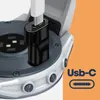 A close-up view of a USB-C adapter being plugged into a smartwatch. Produktbild-Vorschau