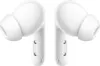 A pair of white wireless earbuds are shown against a white background. Náhled obrázku produktu