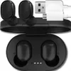 A pair of black wireless earbuds and their charging case are displayed with charging cables and a USB adapter. Podgląd zdjęcia produktu
