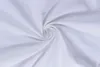 A close-up, top-down view of a white bed sheet, swirled into a vortex shape. Produktbild-Vorschau