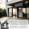 A modern house with a patio and a retractable awning. Náhled obrázku produktu