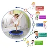 A girl jumping on a mini trampoline in a room, with diagrams illustrating the benefits of trampolining. Podgląd zdjęcia produktu