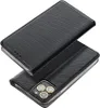 A black flip phone case is shown from a diagonal angle, with the cover open to reveal the phone inside. Náhled obrázku produktu