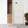 A white shoe cabinet with three slatted drawers stands next to a white wardrobe with visible wooden shelves and drawers. A small green plant sits on top of the shoe cabinet. Produktbild-Vorschau