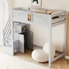 A gray loft bed with storage stairs and a cabinet, shown in a room setting with a white chair. Náhled obrázku produktu