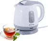 A white and gray electric kettle with a clear glass cup of tea next to it. Produktbild-Vorschau
