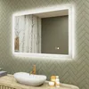 A modern bathroom vanity with a sink, faucet, and a lit mirror. Náhled obrázku produktu