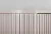 A close-up view of the fluted doors of a beige cabinet. Produktbild-Vorschau