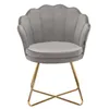A gray velvet chair with gold metal legs. Voir les images du produit