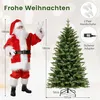 A Santa Claus figure standing next to a Christmas tree, with dimensions indicated. Náhled obrázku produktu