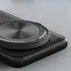 Close-up of a black phone case with a circular magnetic attachment. Produktbild-Vorschau