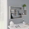 A modern wall shelf unit with several compartments, displaying books, a framed picture, and decorative items. The shelf is mounted on a light gray wall, with a white curtain visible on the left. Produktbild-Vorschau