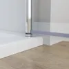 A close-up view of the bottom corner of a shower enclosure, showing the base and a metal support post. Produktbild-Vorschau