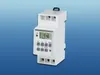 A digital timer with a display and buttons, mounted on a blue gradient background. Produktbild-Vorschau