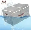 A gray storage box with a lid and handles is partially submerged in water, with water splashes around it. The word 'Washable' is visible at the top left. Podgląd zdjęcia produktu