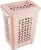 A light pink laundry basket with a lid, shown from a slightly elevated front-left angle against a white background. Anteprima dell’immagine prodotto