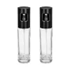 Two clear glass spray bottles with black spray tops are shown against a white background. Produktbild-Vorschau