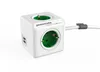 A white power cube with green electrical outlets and USB ports, connected to a white power cord with a gray clip. Produktbild-Vorschau