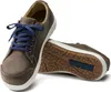 A pair of brown Birkenstock shoes with blue laces, shown from a slightly angled perspective with one shoe lying on its side to reveal the sole. Produktbild-Vorschau