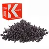 A box of Klimas premium fasteners and a pile of black screws. Anteprima dell’immagine prodotto