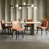 A dining room set with chairs around a table, under a modern chandelier. Náhľad obrázku produktu