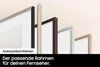 A close-up view of multiple interchangeable frames for a TV, displayed in a row against a light background. Voir les images du produit