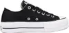 A side view of a black Converse Chuck Taylor All Star Lift Ox platform sneaker against a white background. Voir les images du produit