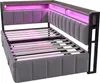 A modern upholstered bed frame with integrated LED lighting and storage. Produktbild-Vorschau