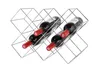 A silver metal wine rack holding four bottles of red wine. Produktbild-Vorschau