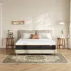 A bedroom scene with a bed, mattress, nightstands, and rug. Produktbild-Vorschau
