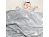 A baby sleeping peacefully under a soft, star-patterned blanket. Anteprima dell’immagine prodotto