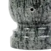 A close-up view of the base of a granite vase. Anteprima dell’immagine prodotto