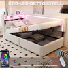 A bedroom scene featuring a white bed frame with integrated storage and RGB LED lighting. Podgląd zdjęcia produktu