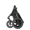 A folded jogger stroller shown from the side against a white background. Náhľad obrázku produktu