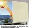 A balcony with a beige roller blind blocking sunlight and UV rays. Voir les images du produit