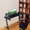 A gaming desk setup with a computer monitor, keyboard, mouse, and gaming chair. Náhled obrázku produktu