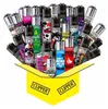 A collection of Clipper lighters of various designs, spilling out of a yellow box with the Clipper logo. Podgląd zdjęcia produktu