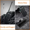 Collage of images showing a black walkie-talkie on a rocky surface, with text overlays highlighting its features. Produktbild-Vorschau