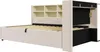 A bed frame with a headboard featuring shelves and integrated storage compartments. Anteprima dell’immagine prodotto
