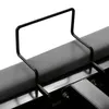 A close-up view of a black metal handle attached to a gray upholstered surface, likely part of a bed frame. Produktbild-Vorschau